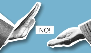 Artistic image showing hands with a 'NO!' message symbolizing disagreement.