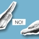 Artistic image showing hands with a 'NO!' message symbolizing disagreement.